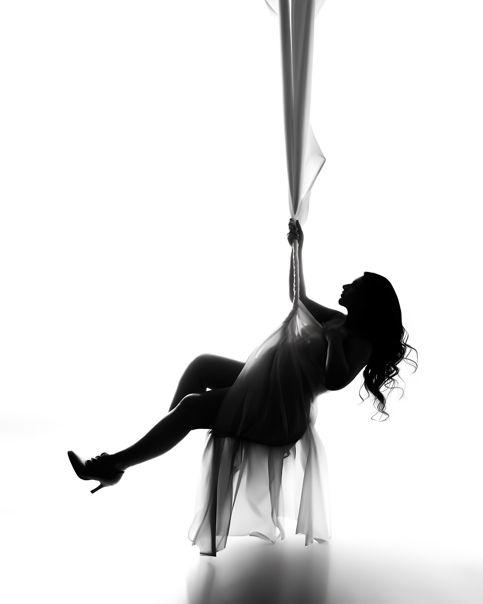Dallas Maternity Photographer | Sunset Boho-Inspired Portrait Artistic black and white silhouette maternity portrait by Dallas pregnancy photographer