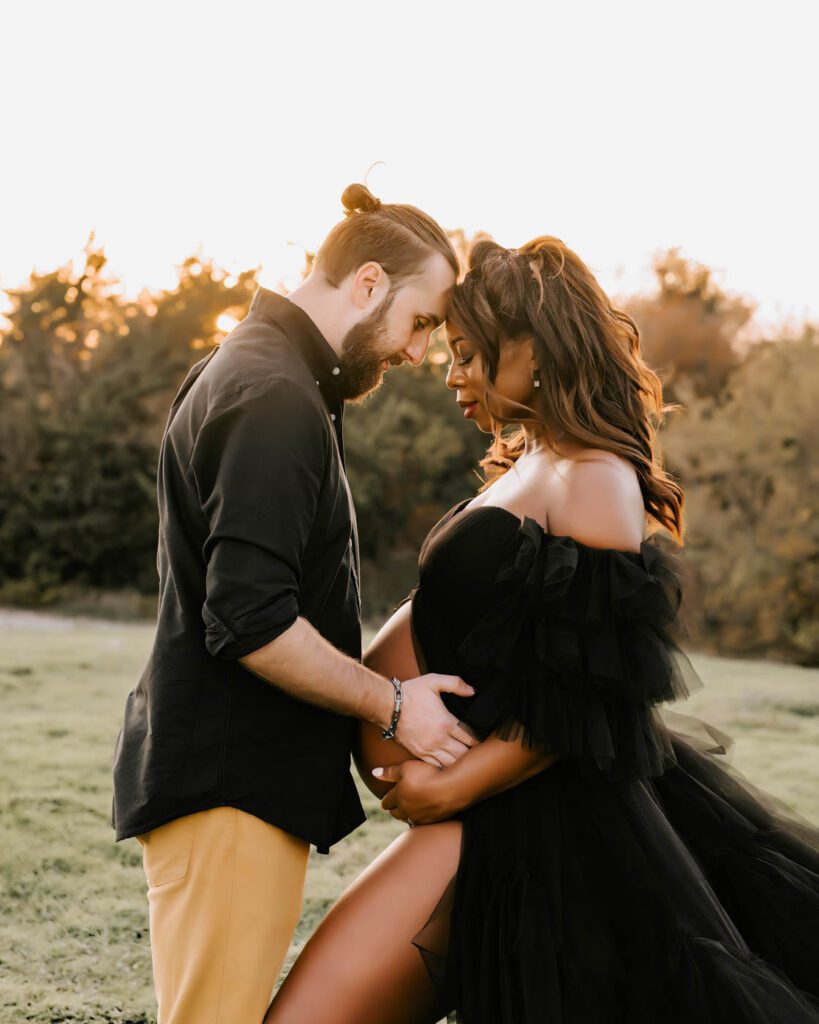 Maternity Photos With Pets: When Your First Baby Joins The Session 12 Couples Maternity Photos In Dallas Featuring Expectant Parents Sharing A Quiet Moment Together During An Outdoor Sunset Session.