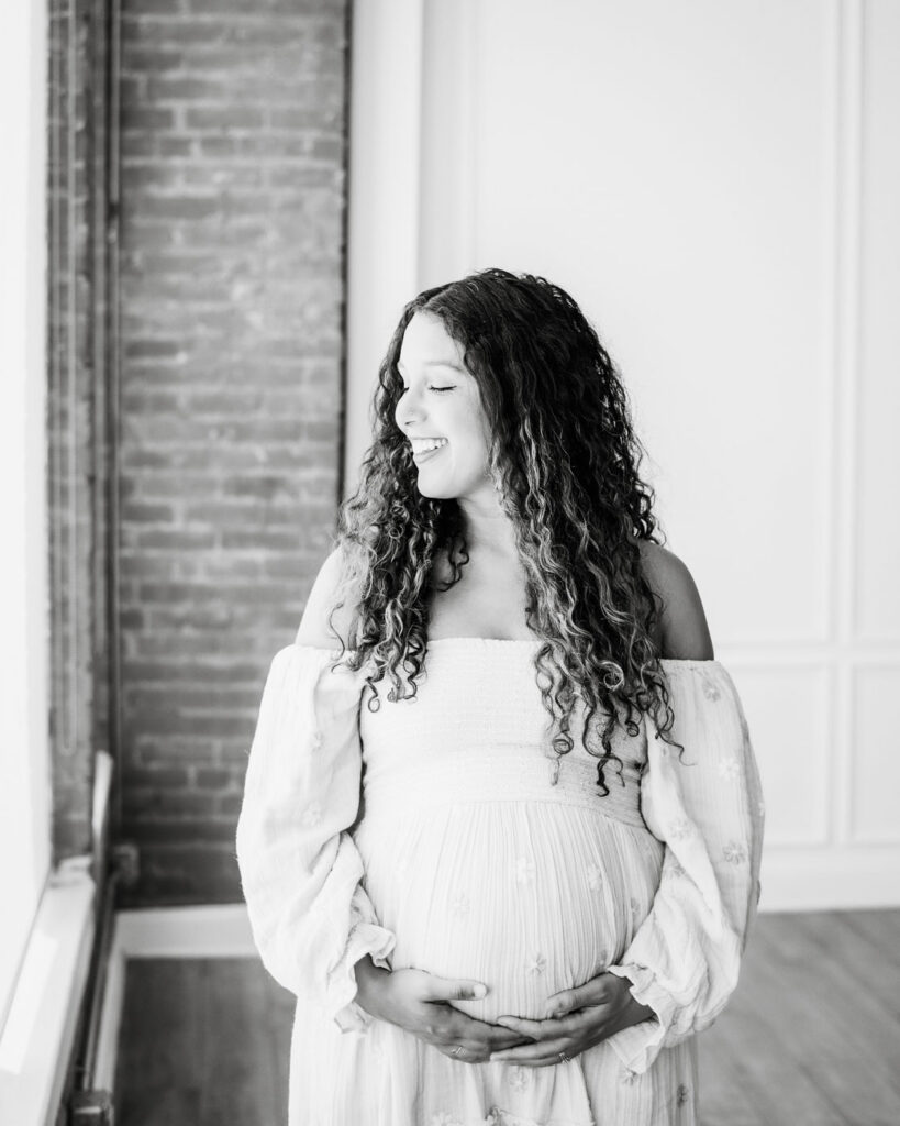 Why Experience Matters In Maternity Photography 10 Black-And-White Solo Maternity Portrait During A Dallas Studio Maternity Photography Session