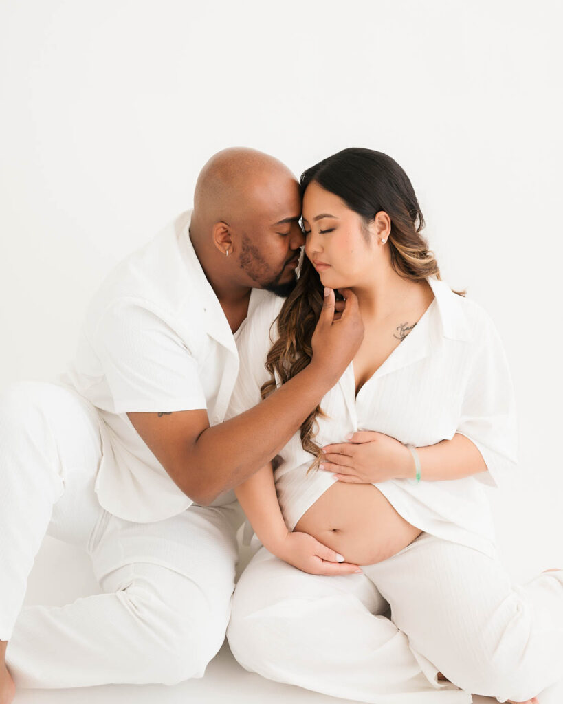 Emotional Maternity Couple Portrait Photographed Inside Dallas Maternity Studio