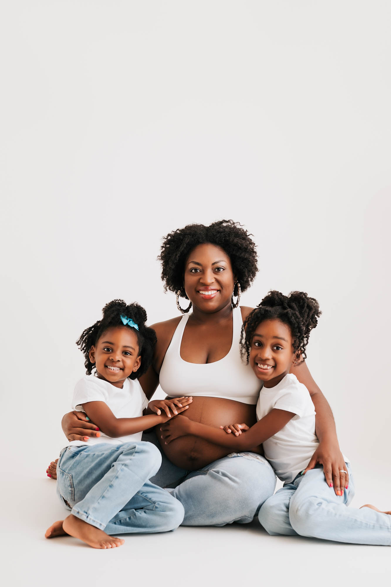 Smiling Mother With Two Young Daughters Hugging Baby Bump – Dallas Maternity And Pregnancy Photographer Lily Hayes Photography