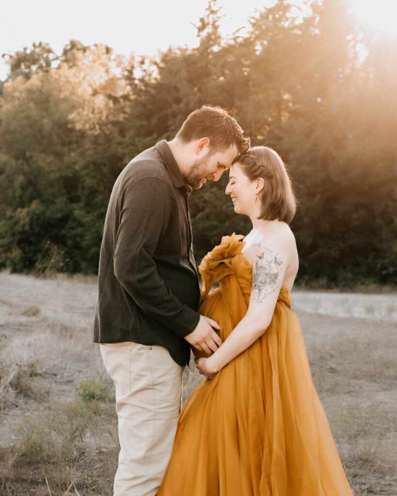The Details That Make Maternity Portraits Feel Elevated 7 Couple Sharing A Joyful Moment During Maternity Photoshoot In Dallas At Sunset