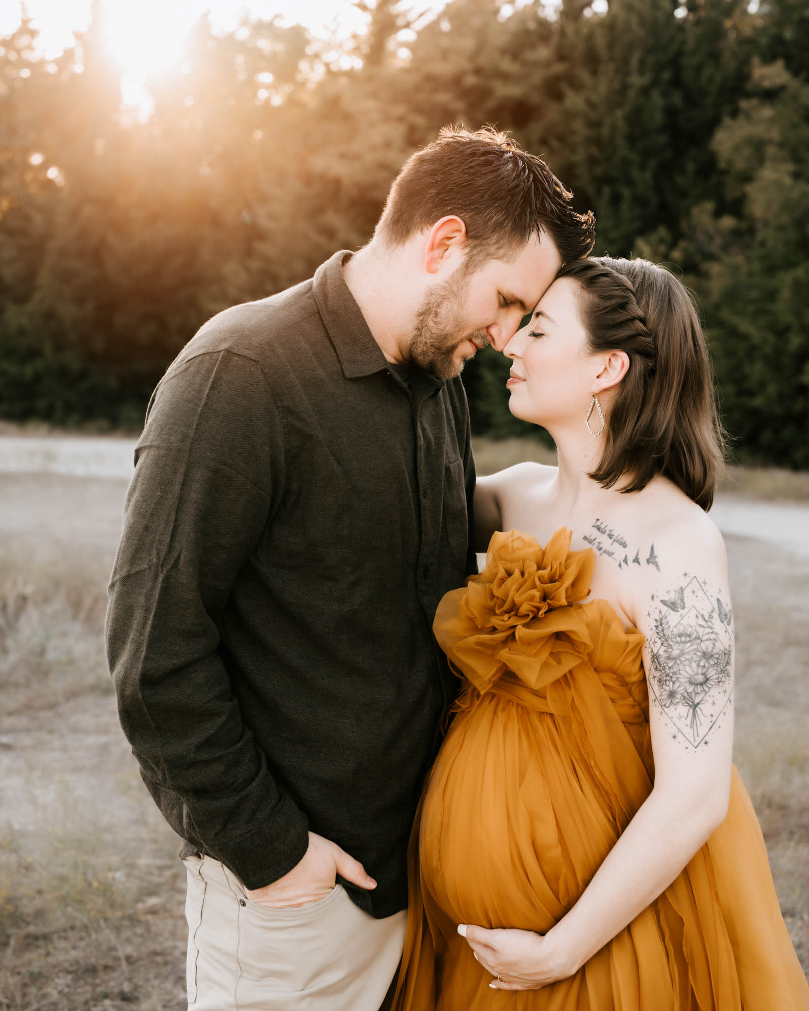 Expecting Parents Holding Baby Bump In Golden Hour Maternity Shoot In Dallas