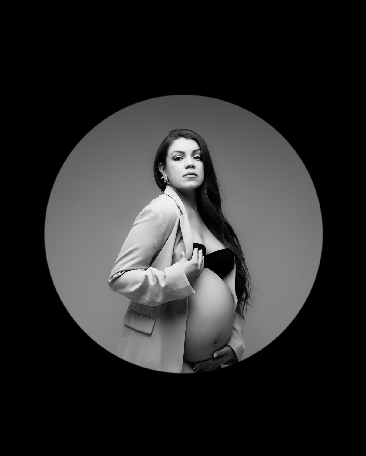 Fine art black and white maternity portrait of expecting mother in blazer photographed by Dallas maternity photographer Lily Hayes Photography