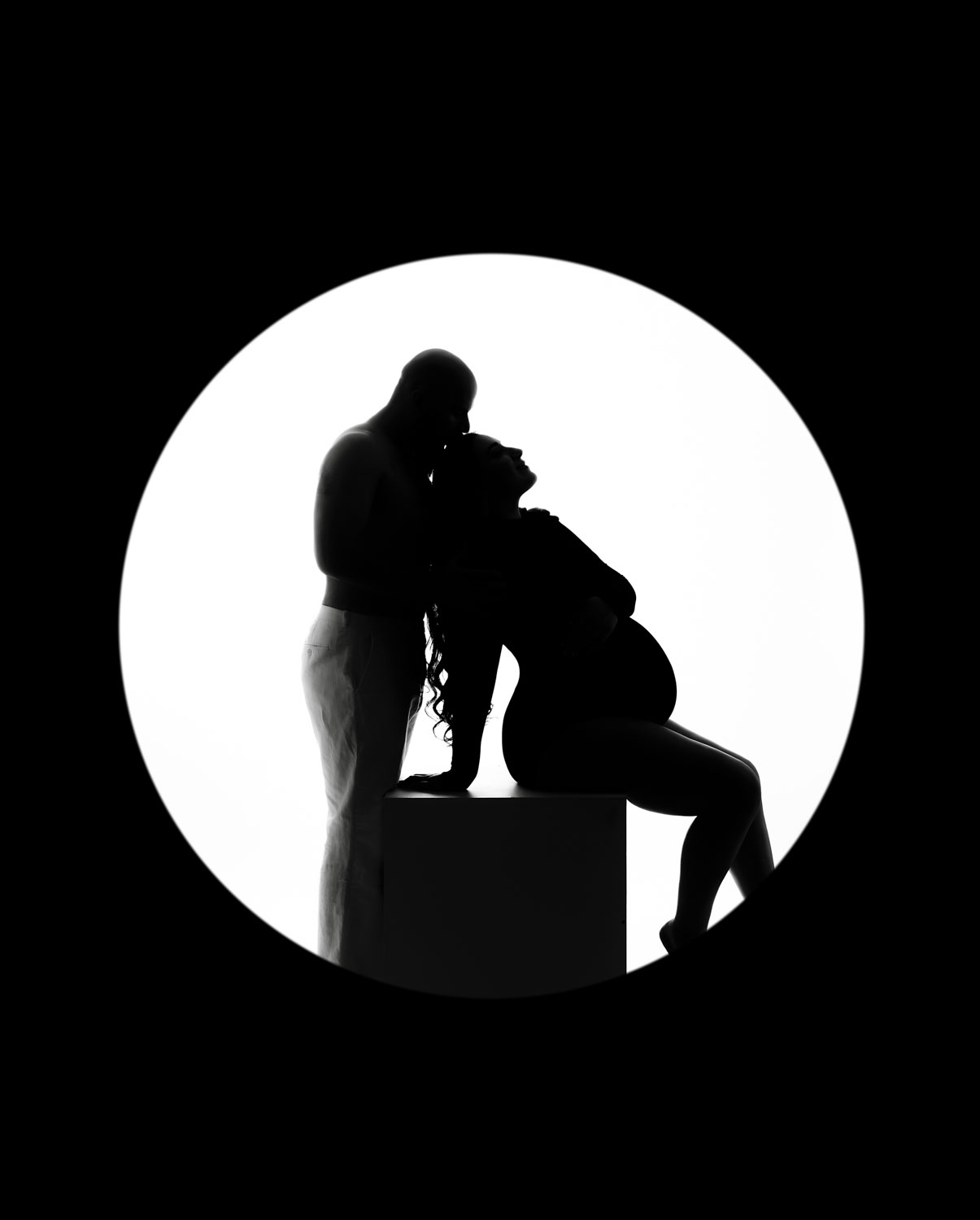 Silhouette maternity couple portrait in studio by Dallas maternity photographer Lily Hayes Photography
