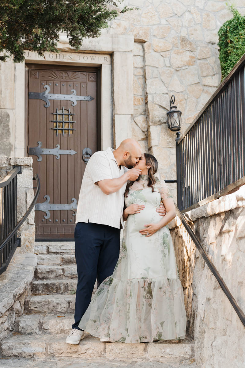 Dallas Maternity Photography Couple Embracing On Stone Steps During Elegant Outdoor Session