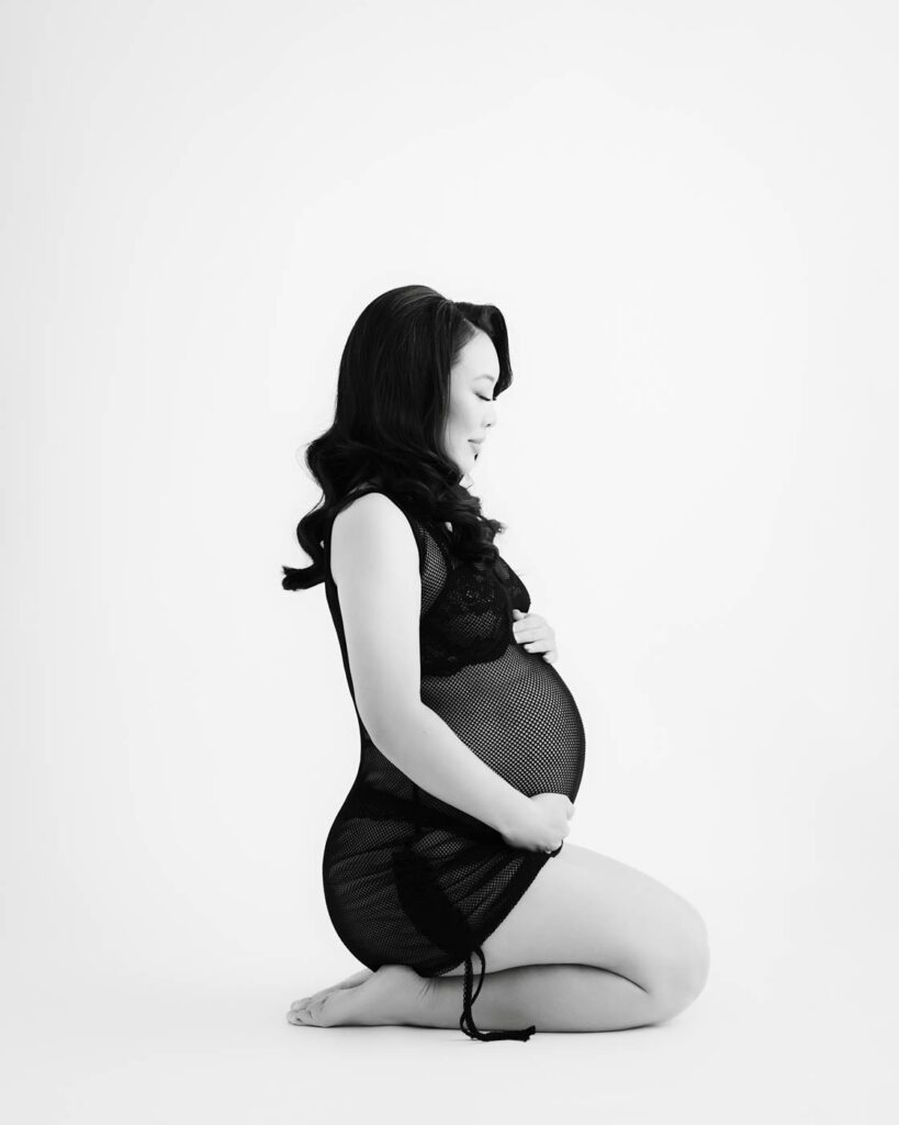 Why Black &Amp; White Maternity Portraits Never Go Out Of Style 13 Studio Black And White Maternity Portrait Featuring A Classic Pregnancy Pose In Dallas, Texas.