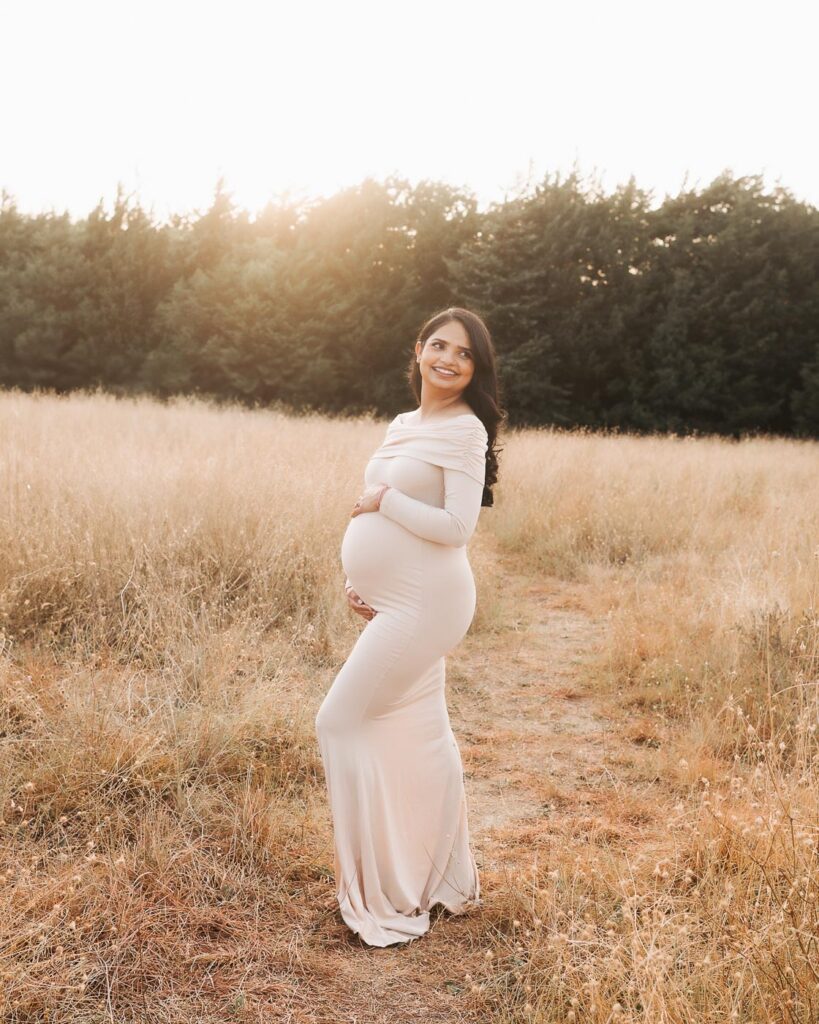 Maternity Photographer In Dallas Photographs Expecting Mother In Profile During A Warm Summer Outdoor Maternity Session.