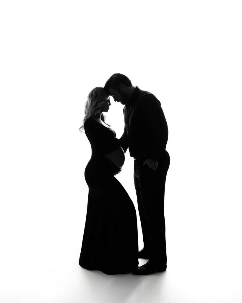 Questions To Ask A Maternity Photographer In Dallas 14 Maternity Photographer Dallas Studio Silhouette Portrait Of An Expecting Couple
